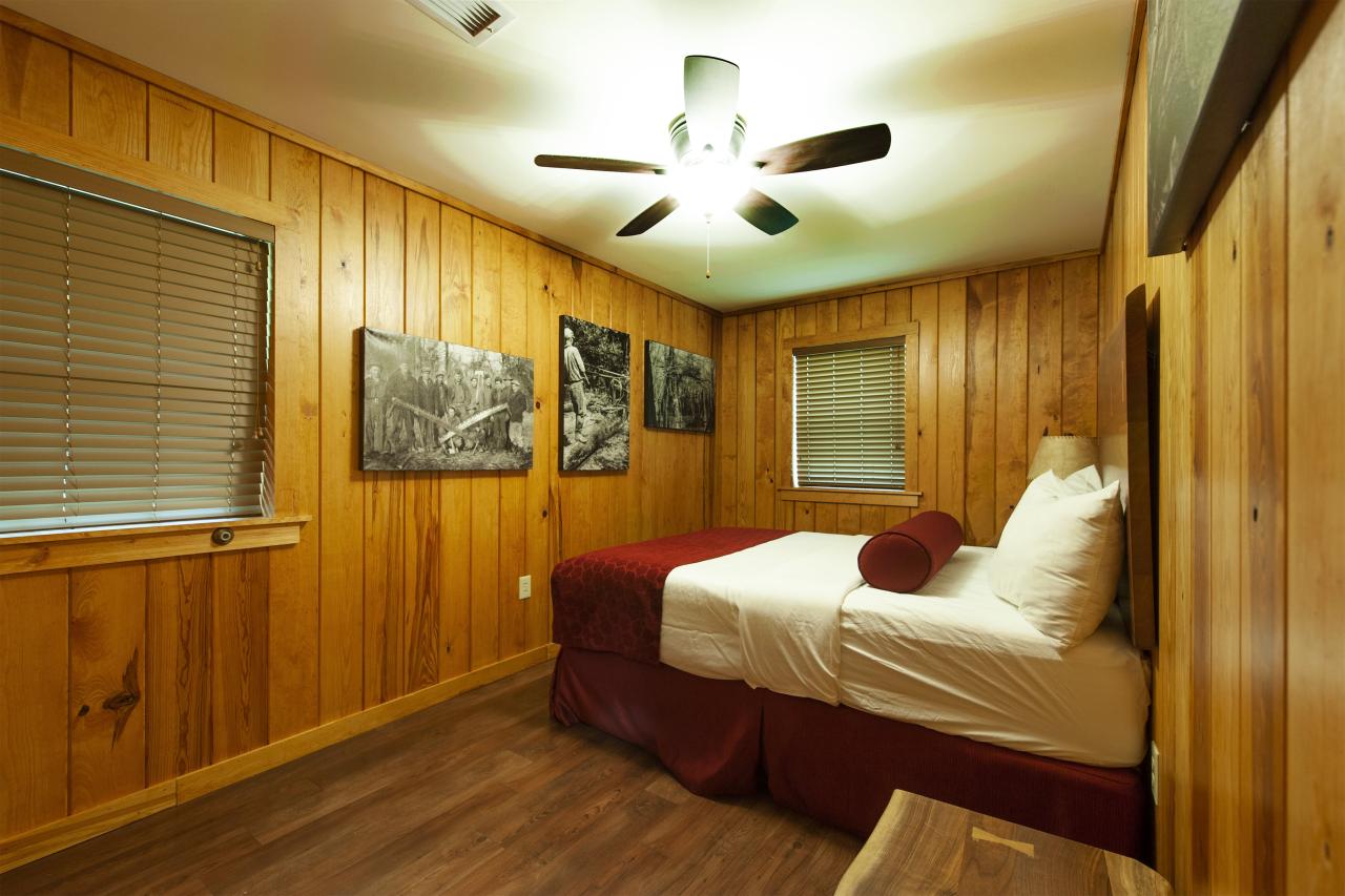 A view of one of the bedrooms with a bed at the CCC cabin at Crowley's Ridge State Park